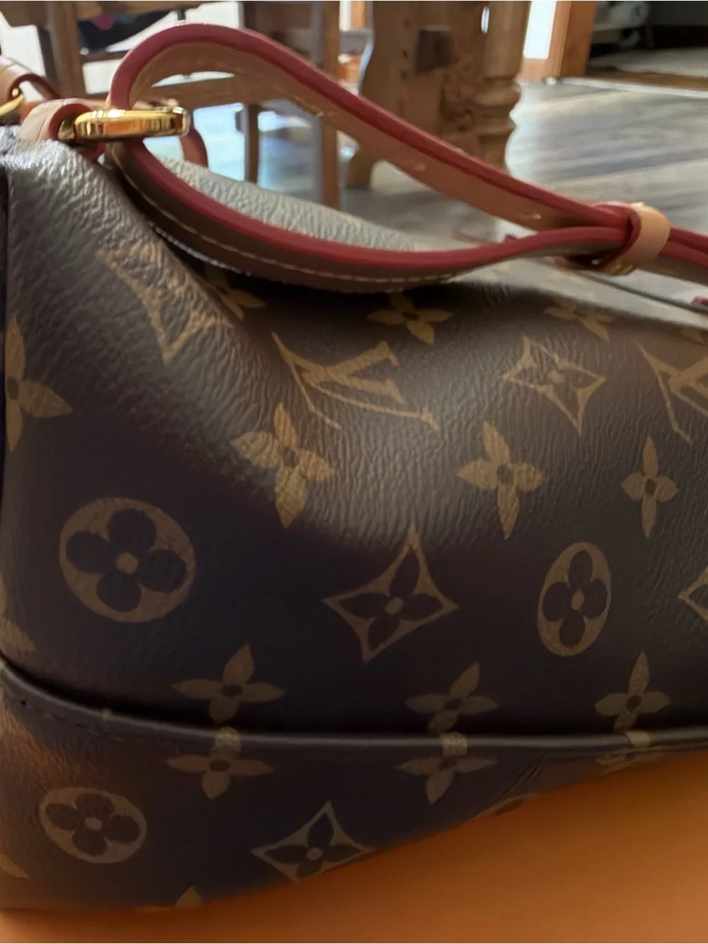 Louis Vuitton Monogram Canvas Backpack with Tan Leather Trim and Pink Charm
